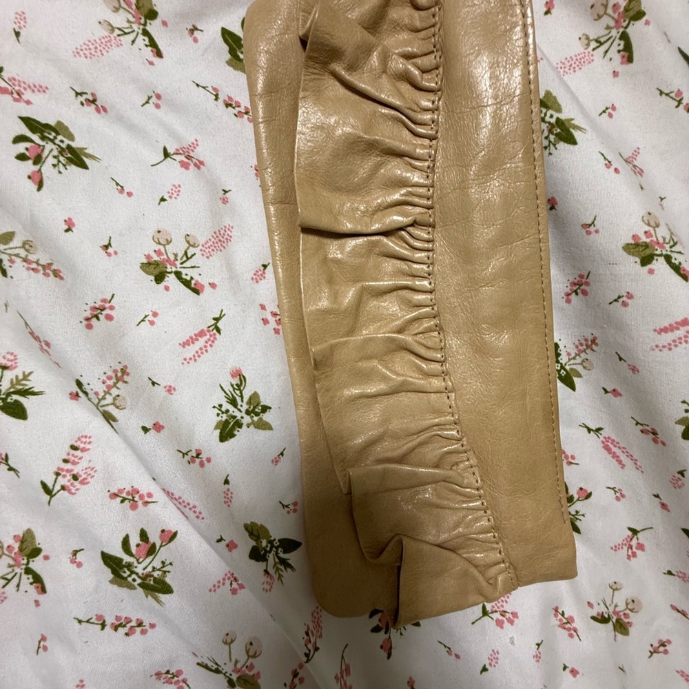 Sabina Tan leather clutch